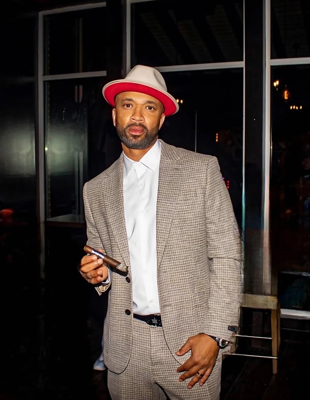 Omar McGee, founder and CEO, holding a Rose Gold Reserve