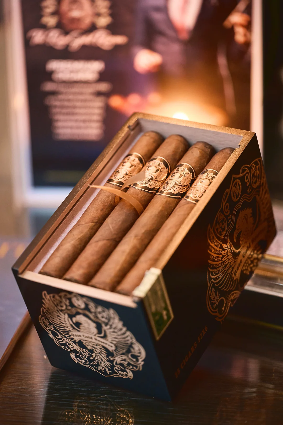 Open box of The Rose Gold Reserve cigars with black and rose gold bands